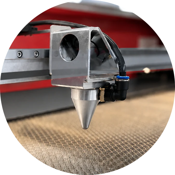 Laser head and Air-Assist nozzle over a honeycomb cutting table